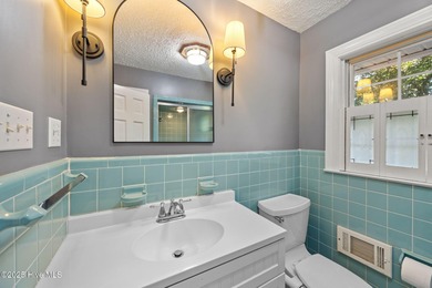 Welcome to this beautiful 4,380 sqft home, perfectly positioned on Greenville Country Club in North Carolina - for sale on GolfHomes.com, golf home, golf lot