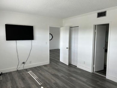 Spacious 2BR/2BA condo in the peaceful 55+ community of Oriole on Oriole Golf and Tennis Club in Florida - for sale on GolfHomes.com, golf home, golf lot