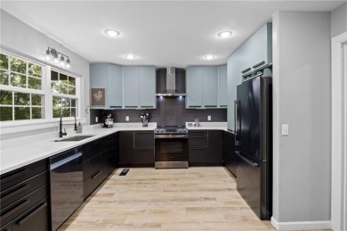 Beautiful remodeled home that backs up to the Tunnel Vision Bike on Bella Vista Country Club and Golf Course in Arkansas - for sale on GolfHomes.com, golf home, golf lot