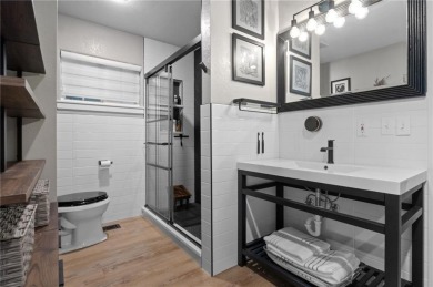 Beautiful remodeled home that backs up to the Tunnel Vision Bike on Bella Vista Country Club and Golf Course in Arkansas - for sale on GolfHomes.com, golf home, golf lot