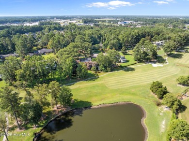 Welcome to this beautiful 4,380 sqft home, perfectly positioned on Greenville Country Club in North Carolina - for sale on GolfHomes.com, golf home, golf lot