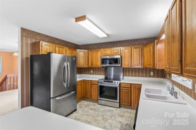 LAKEFRONT LIVING AS IT'S FINEST! Nestled in serene natural on Connestee Falls Golf Club in North Carolina - for sale on GolfHomes.com, golf home, golf lot
