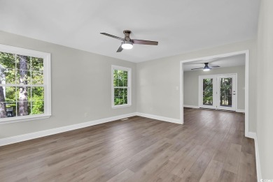 Windjammer Village community is conveniently located just inside on Glen Dornoch Waterway Golf Links in South Carolina - for sale on GolfHomes.com, golf home, golf lot
