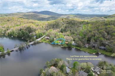 LAKEFRONT LIVING AS IT'S FINEST! Nestled in serene natural on Connestee Falls Golf Club in North Carolina - for sale on GolfHomes.com, golf home, golf lot