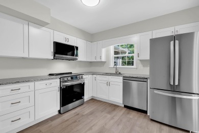 Windjammer Village community is conveniently located just inside on Glen Dornoch Waterway Golf Links in South Carolina - for sale on GolfHomes.com, golf home, golf lot