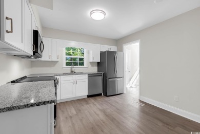 Windjammer Village community is conveniently located just inside on Glen Dornoch Waterway Golf Links in South Carolina - for sale on GolfHomes.com, golf home, golf lot