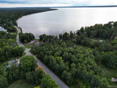 This phenomenal building site sits just a stones throw away from on Indian Lake Golf and Country Club in Michigan - for sale on GolfHomes.com, golf home, golf lot