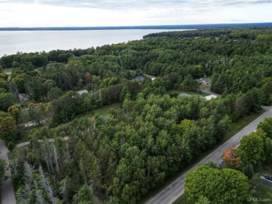 This phenomenal building site sits just a stones throw away from on Indian Lake Golf and Country Club in Michigan - for sale on GolfHomes.com, golf home, golf lot