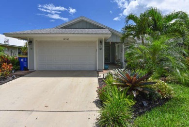 This charming home sits pretty on an oversized lot with stunning on Eagle Wood Golf Course in Florida - for sale on GolfHomes.com, golf home, golf lot