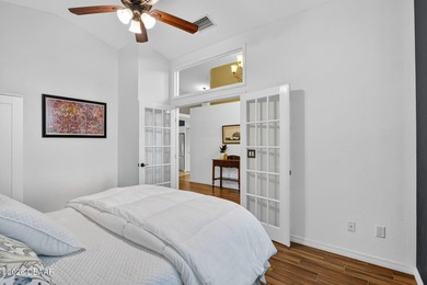 LAKEFRONT fountain views set the tone for this exceptional POOL on Plantation Bay Golf and Country Club in Florida - for sale on GolfHomes.com, golf home, golf lot