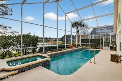 LAKEFRONT fountain views set the tone for this exceptional POOL on Plantation Bay Golf and Country Club in Florida - for sale on GolfHomes.com, golf home, golf lot