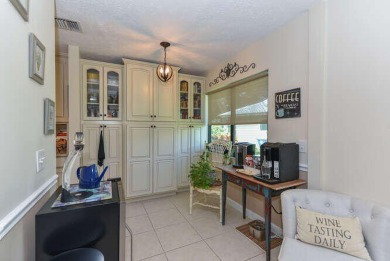 This charming home sits pretty on an oversized lot with stunning on Eagle Wood Golf Course in Florida - for sale on GolfHomes.com, golf home, golf lot