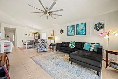 This end-unit residence offers 2 bedrooms plus a den and 2 full on Colonial Country Club in Florida - for sale on GolfHomes.com, golf home, golf lot