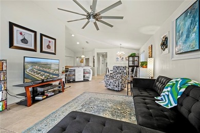 This end-unit residence offers 2 bedrooms plus a den and 2 full on Colonial Country Club in Florida - for sale on GolfHomes.com, golf home, golf lot