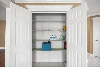 Welcome home to 337 Louise Circle, where thoughtful design on Indian Bayou Golf and Country Club in Florida - for sale on GolfHomes.com, golf home, golf lot