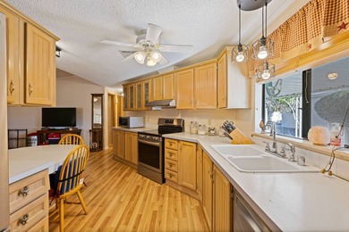 Charming 2-bedroom, 2-bath home offering 1,534 sq. ft. of on Painted Mountain Golf Club in Arizona - for sale on GolfHomes.com, golf home, golf lot