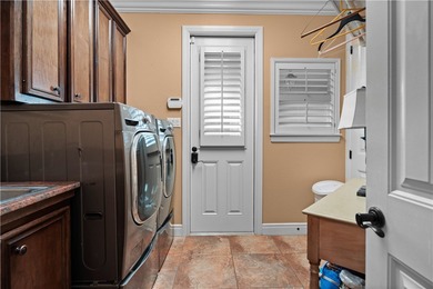 Tucked away on a quiet cul-de-sac in Calallen, this grand estate on River Hills Country Club in Texas - for sale on GolfHomes.com, golf home, golf lot