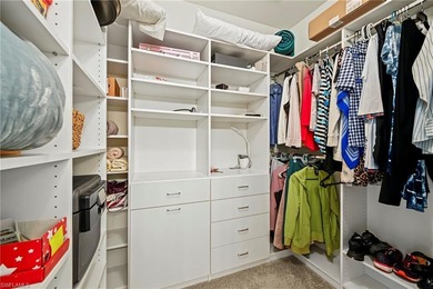 This end-unit residence offers 2 bedrooms plus a den and 2 full on Colonial Country Club in Florida - for sale on GolfHomes.com, golf home, golf lot