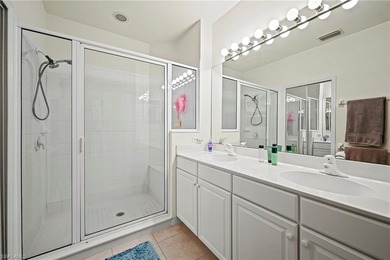 This end-unit residence offers 2 bedrooms plus a den and 2 full on Colonial Country Club in Florida - for sale on GolfHomes.com, golf home, golf lot