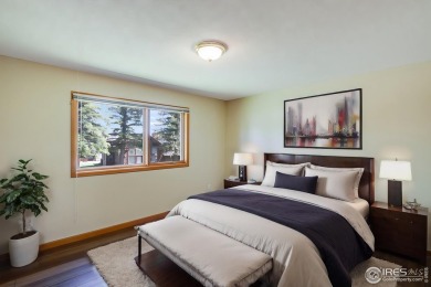 This beautifully updated townhome offers the perfect blend of on Estes Park Golf Course in Colorado - for sale on GolfHomes.com, golf home, golf lot