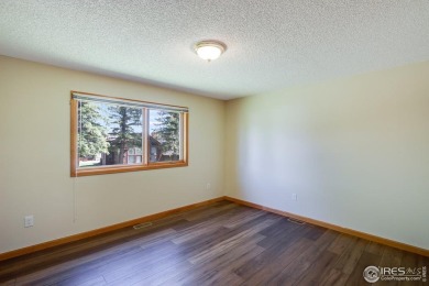 This beautifully updated townhome offers the perfect blend of on Estes Park Golf Course in Colorado - for sale on GolfHomes.com, golf home, golf lot