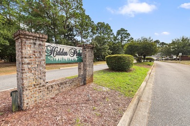 Welcome home to 337 Louise Circle, where thoughtful design on Indian Bayou Golf and Country Club in Florida - for sale on GolfHomes.com, golf home, golf lot