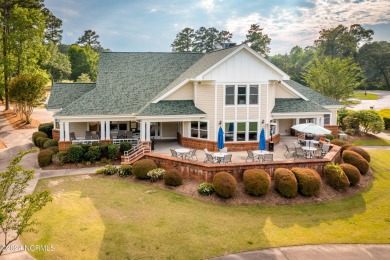 Don't miss this .47 acre wooded golf course lot overlooking the on Cypress Landing Golf Club in North Carolina - for sale on GolfHomes.com, golf home, golf lot