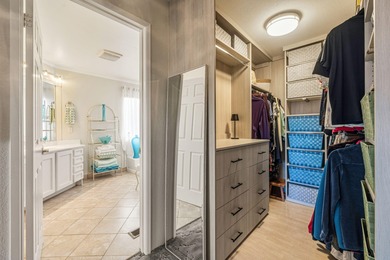 Welcome to this spacious 1,792 sq ft manufactured home situated on Ivey Ranch Country Club in California - for sale on GolfHomes.com, golf home, golf lot