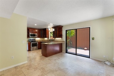 Under contract-accepting backup offers. Welcome to this on Mayfair Country Club in Florida - for sale on GolfHomes.com, golf home, golf lot