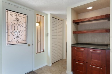 Under contract-accepting backup offers. Welcome to this on Mayfair Country Club in Florida - for sale on GolfHomes.com, golf home, golf lot