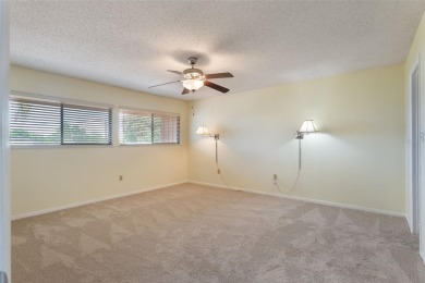 Under contract-accepting backup offers. Welcome to this on Mayfair Country Club in Florida - for sale on GolfHomes.com, golf home, golf lot