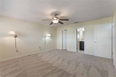 Under contract-accepting backup offers. Welcome to this on Mayfair Country Club in Florida - for sale on GolfHomes.com, golf home, golf lot