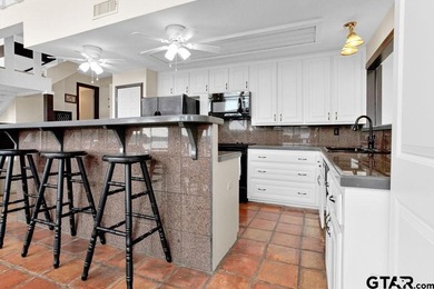 Welcome to your private lakefront retreat in the prestigious on Hide-A-Way Lake Golf Course in Texas - for sale on GolfHomes.com, golf home, golf lot