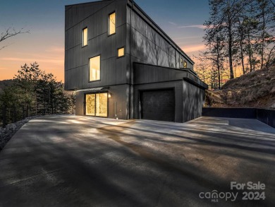 There's nothing like this in Western NC! Stunning, ultra-modern on Rumbling Bald Resort on Lake Lure in North Carolina - for sale on GolfHomes.com, golf home, golf lot