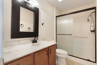 Under contract-accepting backup offers. Welcome to this on Mayfair Country Club in Florida - for sale on GolfHomes.com, golf home, golf lot
