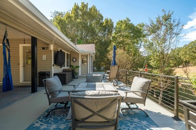 Full of personality and charm, this Diamondhead 2 bed 2.5 bath on Diamondhead Golf and Country Club in Arkansas - for sale on GolfHomes.com, golf home, golf lot