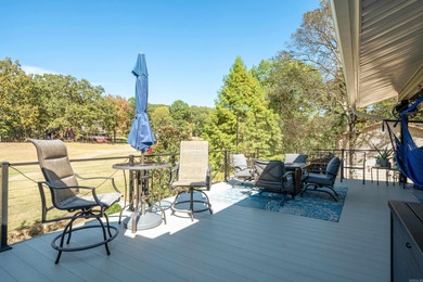Full of personality and charm, this Diamondhead 2 bed 2.5 bath on Diamondhead Golf and Country Club in Arkansas - for sale on GolfHomes.com, golf home, golf lot