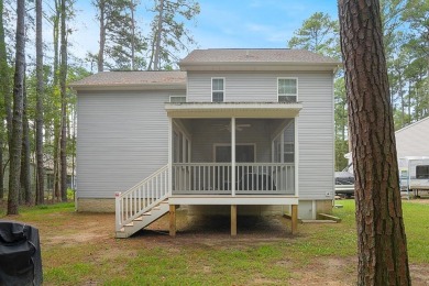 Welcome to your dream home nestled at the end of a serene on Captains Cove Golf and Yacht Club in Virginia - for sale on GolfHomes.com, golf home, golf lot