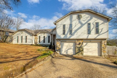 Welcome to this Sherwood gem! Nestled on a large lot across from on The Greens At North Hills Country Club in Arkansas - for sale on GolfHomes.com, golf home, golf lot