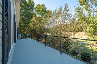 Full of personality and charm, this Diamondhead 2 bed 2.5 bath on Diamondhead Golf and Country Club in Arkansas - for sale on GolfHomes.com, golf home, golf lot