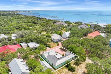Welcome to a hidden gem in the securely gated, cobblestone-lined on Rockport Country Club in Texas - for sale on GolfHomes.com, golf home, golf lot