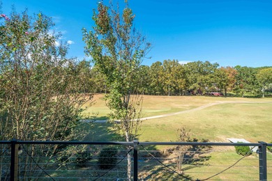 Full of personality and charm, this Diamondhead 2 bed 2.5 bath on Diamondhead Golf and Country Club in Arkansas - for sale on GolfHomes.com, golf home, golf lot