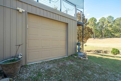 Full of personality and charm, this Diamondhead 2 bed 2.5 bath on Diamondhead Golf and Country Club in Arkansas - for sale on GolfHomes.com, golf home, golf lot