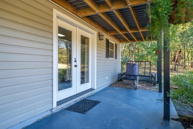 Full of personality and charm, this Diamondhead 2 bed 2.5 bath on Diamondhead Golf and Country Club in Arkansas - for sale on GolfHomes.com, golf home, golf lot