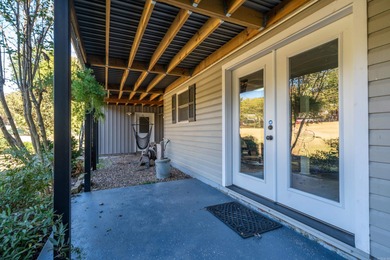Full of personality and charm, this Diamondhead 2 bed 2.5 bath on Diamondhead Golf and Country Club in Arkansas - for sale on GolfHomes.com, golf home, golf lot
