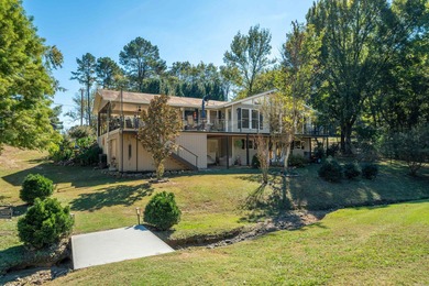Full of personality and charm, this Diamondhead 2 bed 2.5 bath on Diamondhead Golf and Country Club in Arkansas - for sale on GolfHomes.com, golf home, golf lot