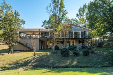 Full of personality and charm, this Diamondhead 2 bed 2.5 bath on Diamondhead Golf and Country Club in Arkansas - for sale on GolfHomes.com, golf home, golf lot