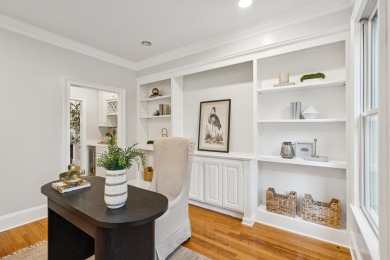 This distinguished two-story brick residence offers four on Dunes West Golf Club in South Carolina - for sale on GolfHomes.com, golf home, golf lot