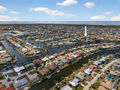 PUNTA GORDA ISLES! STUNNING MODERN 4 BEDROOM PLUS OFFICE, 3.5 on Saint Andrews South Golf Club in Florida - for sale on GolfHomes.com, golf home, golf lot