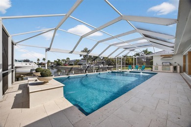 PUNTA GORDA ISLES! STUNNING MODERN 4 BEDROOM PLUS OFFICE, 3.5 on Saint Andrews South Golf Club in Florida - for sale on GolfHomes.com, golf home, golf lot